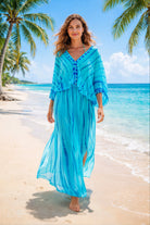 turquoise silk maxi kaftans to wear on holiday by lindsey brown resort wear