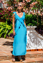 SeenOnSarah wears turquoise silk maxi dress to wear on holiday by Lindsey Brown resort wear