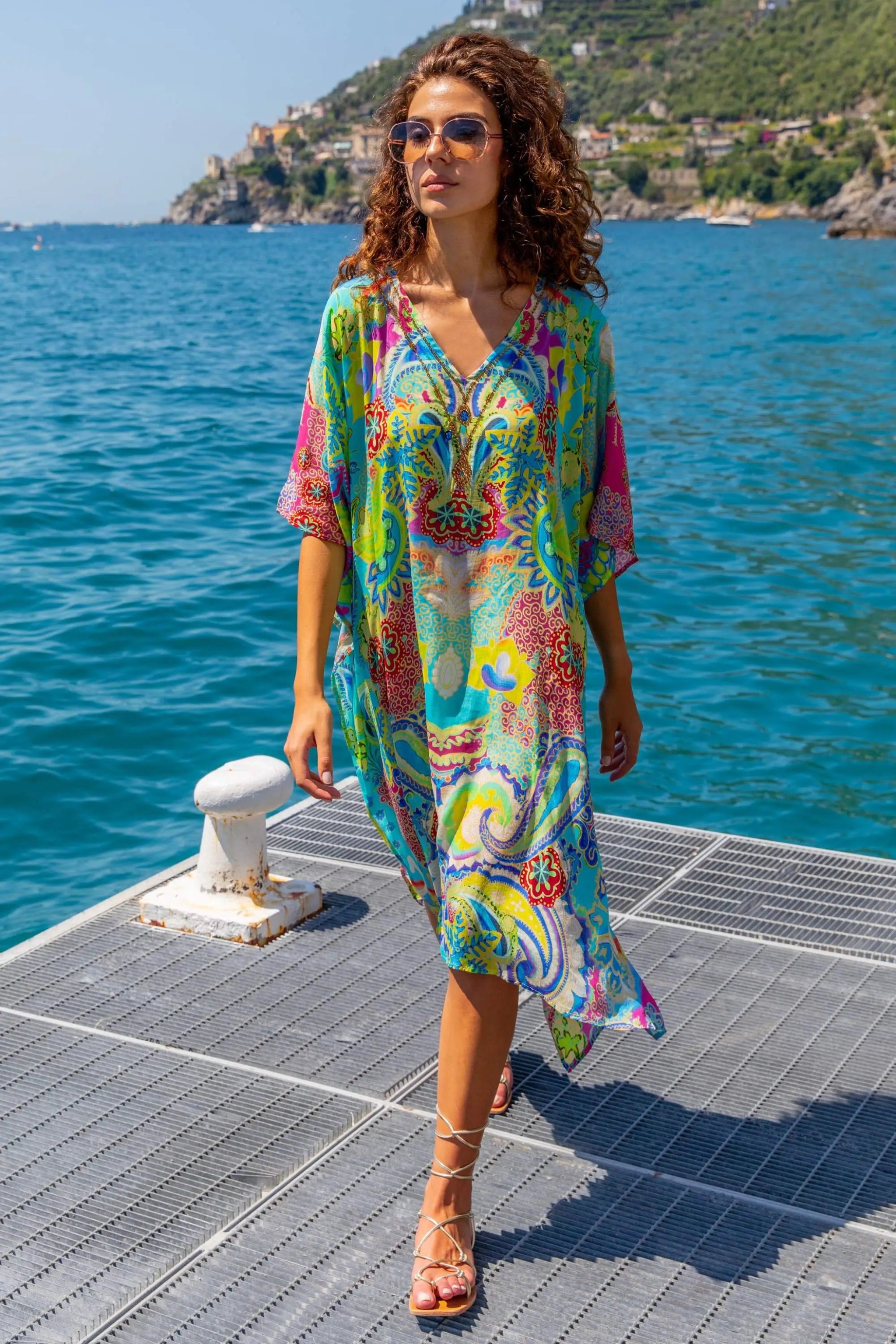 turquoise yellow silk beach cover ups to wear on holiday by Lindsey Brown resort wear