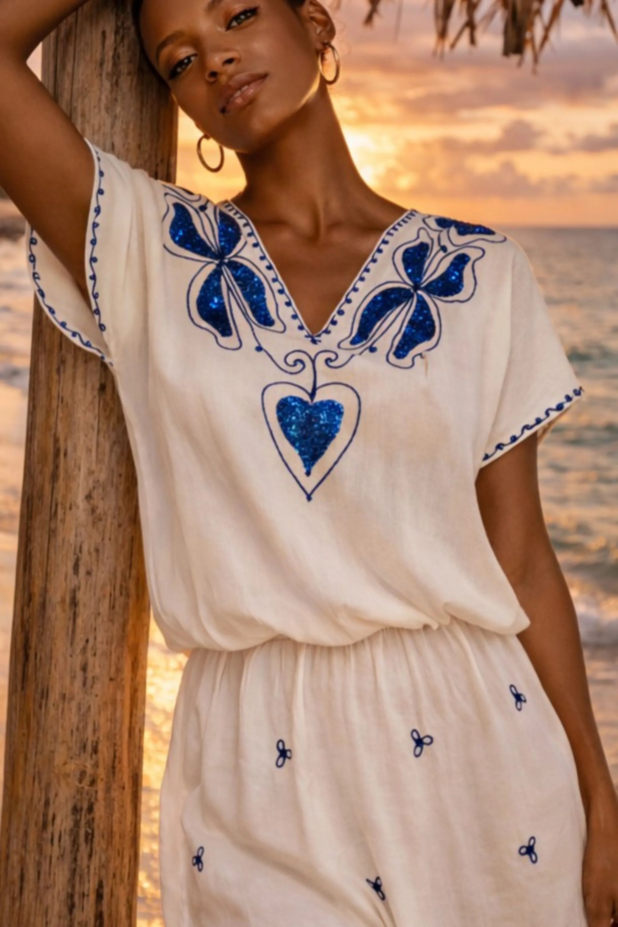 white and blue cotton designer v neck beach dress for caribbean holidays by lindsey brown resort wear
