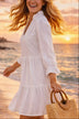 white cotton long sleeved beach dress to wear to the beach
