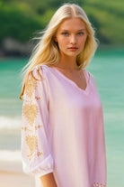 white knee length designer beach dresses by Lindsey Brown resort wear 