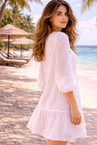 white v neck long sleeved beach dresses to wear on warm holidays 