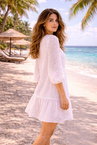 white long sleeved beach dresses with silver embroidery to wear on warm holidays 