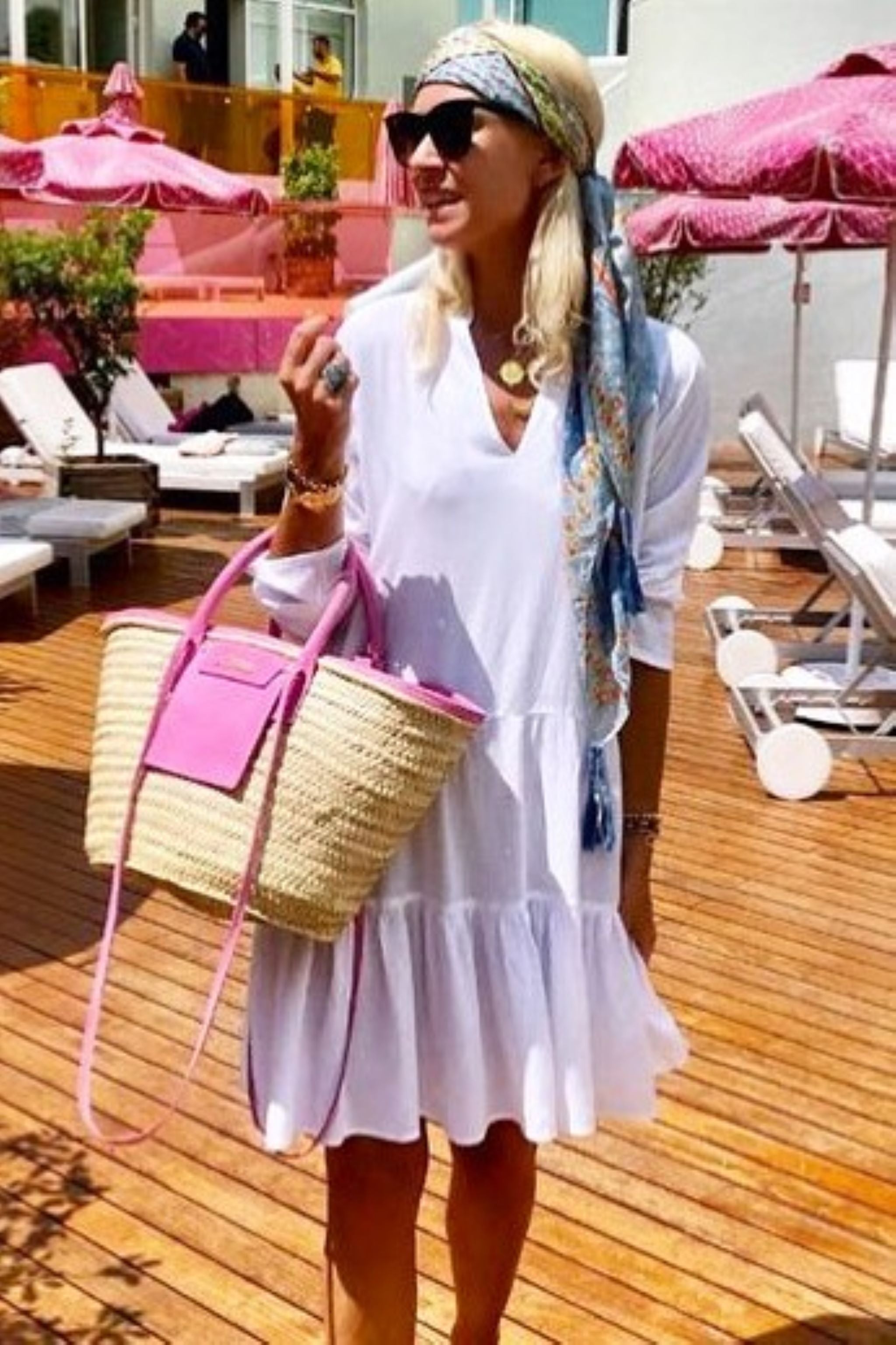 white cotton beach dress with long sleeves by lindsey brown resort wear