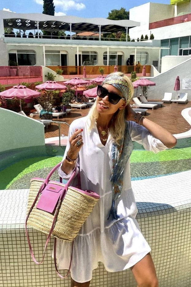 white cotton long sleeved dress to wear on holiday by Lindsey Brown resort wear