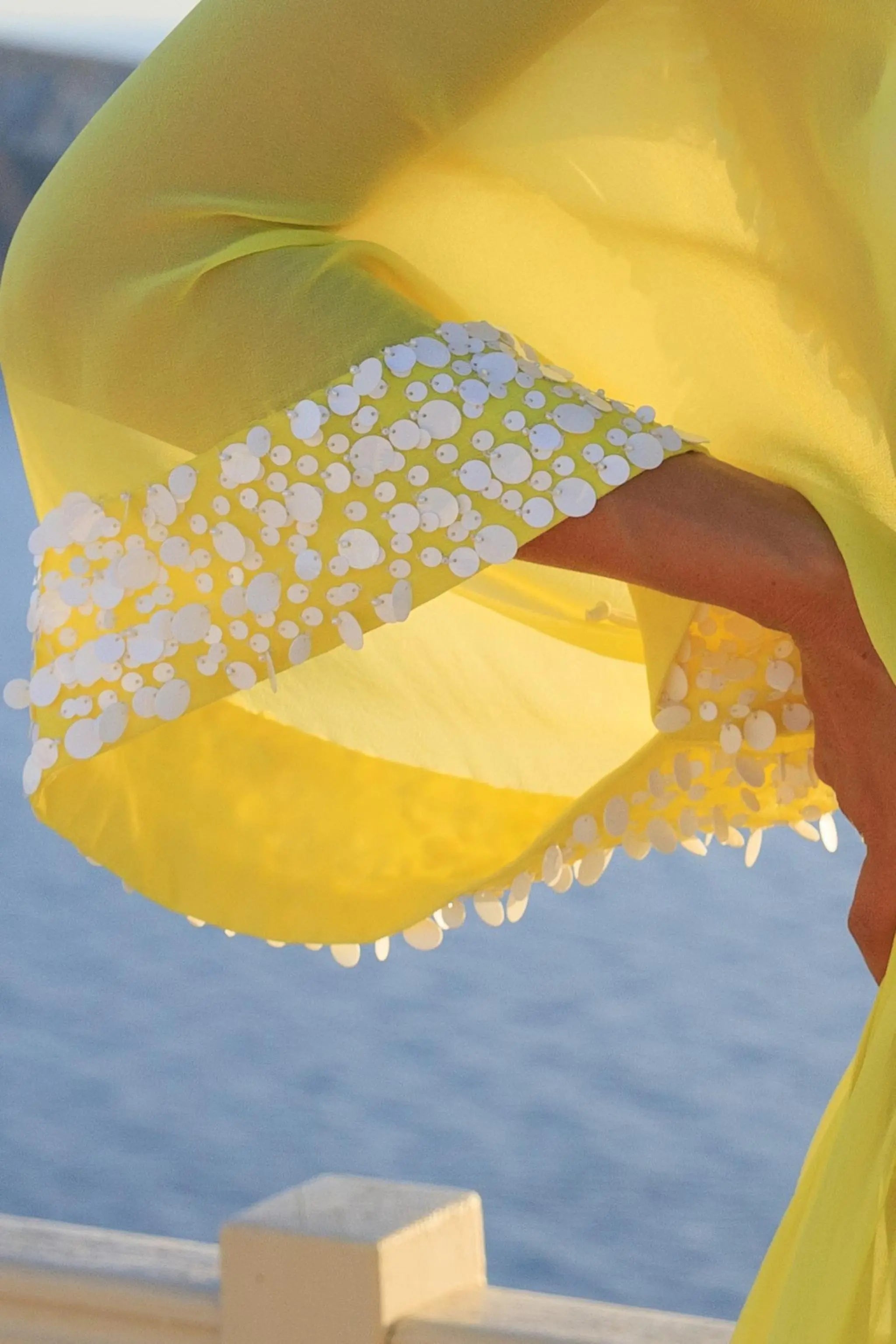 lemon yellow silk short designer kaftan to wear on holiday by Lindsey Brown luxury resort wear