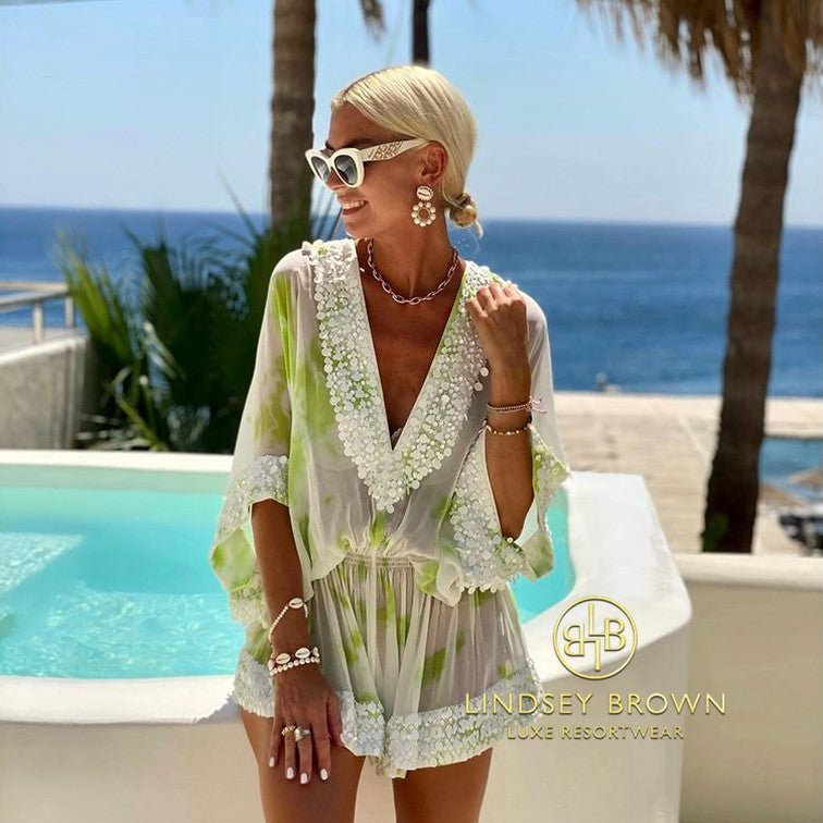 Anna Mavridis wears white and lime silk kaftan by lindsey brown resort wear 