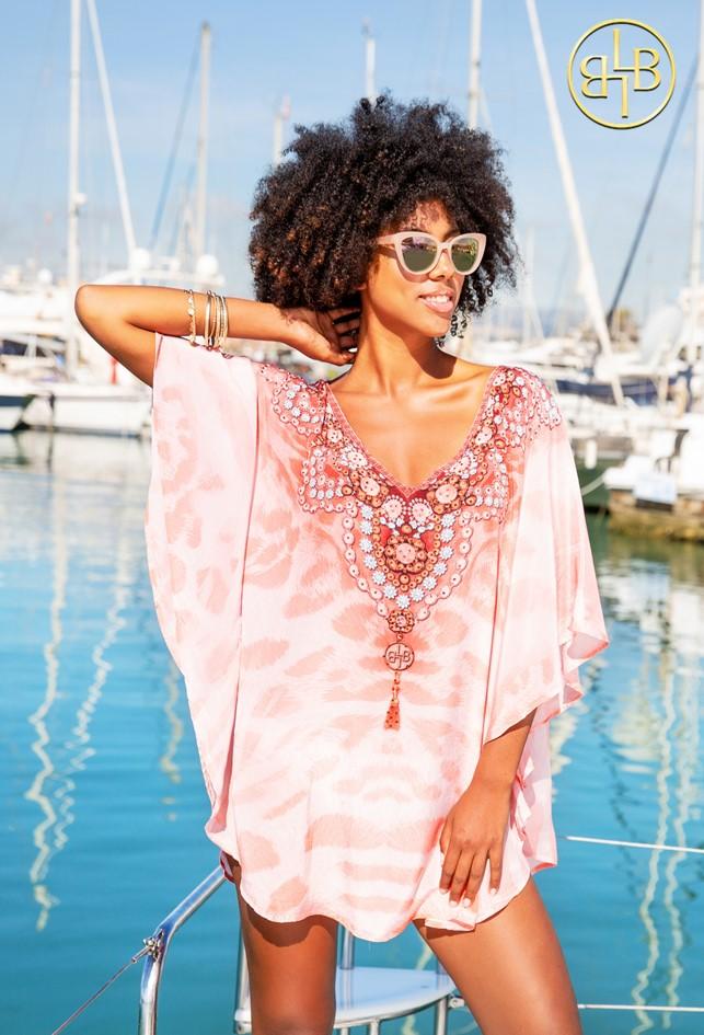 pink designer kaftans to wear on holiday by lindsey brown resort wear 