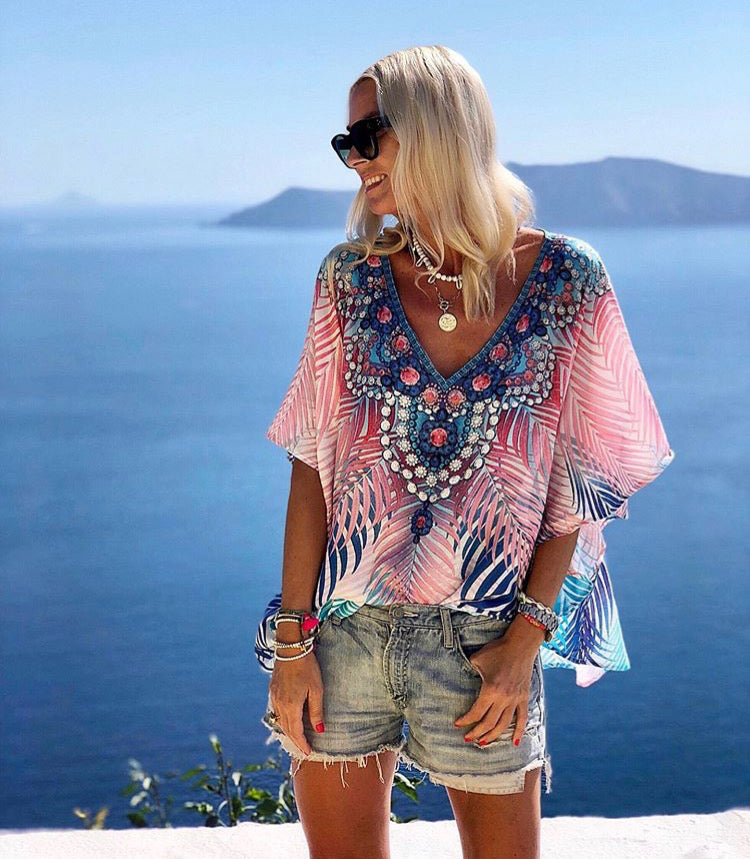 Anna Mavridis wearing palm print Malibu top by Lindsey Brown