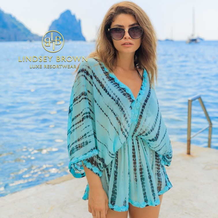blue silk designer kaftans to wear in the Maldives by Lindsey Brown resort wear .
