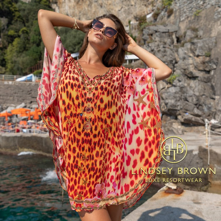 animal print designer beach cover ups to wear on a Cruise holiday 