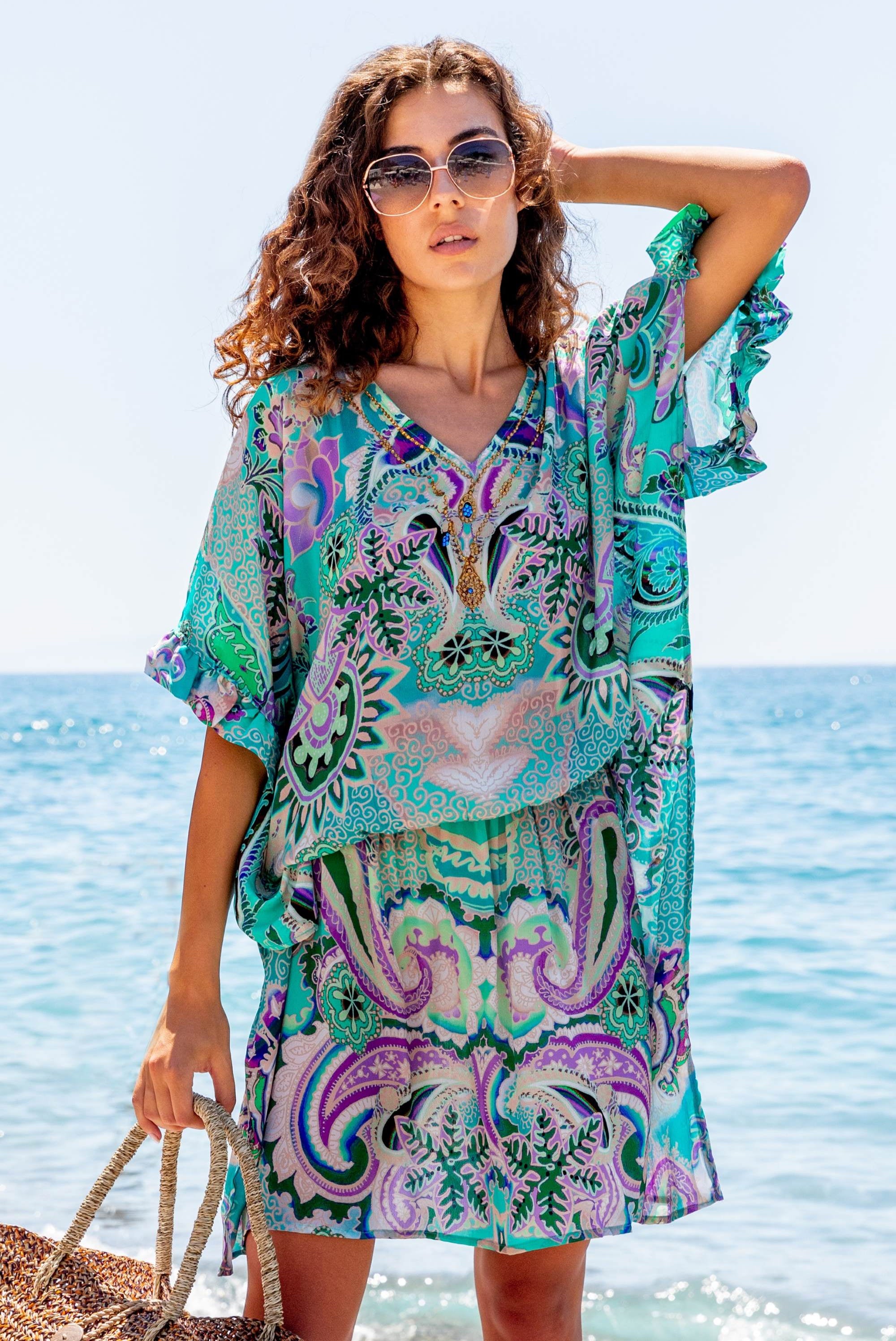 Aqua Drop Waist silk designer Beach Dress in aqua and black silk crepe is a stunning new printed silk beach dress by luxury resort wear Lindsey Brown, such a flattering style