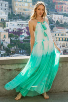 Aqua White silk maxi dresses to wear on holiday by Lindsey Brown luxury silk resort wear 