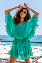 Aqua green silk kaftan dress to wear on a luxury holiday by Lindsey Brown resort wear 