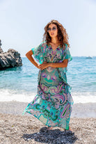 Aqua printed maxi kaftans to wear on holiday by Lindsey Brown luxury resort wear 