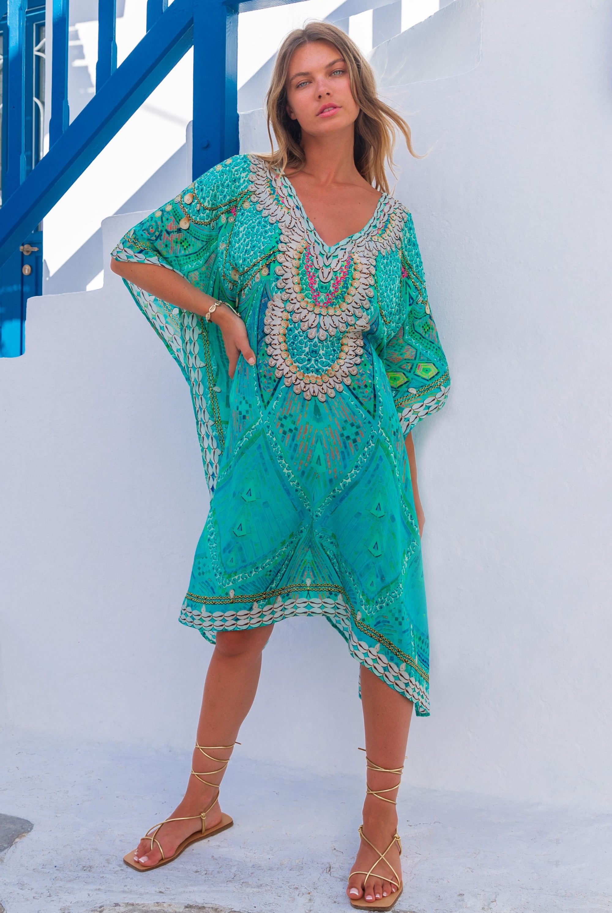 Aqua silk floaty designer kaftans to wear on holiday by Lindsey Brown resort wear 