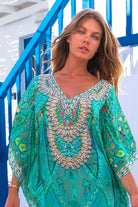 Aqua short sparkly silk designer beach kaftan called Rhodes is a beautiful opaque knee length designer beach coverup by Lindsey Brown luxury resort wear