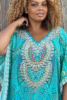 Aqua silk floaty pus size resort wear silk beach coverup  to wear on holiday by Lindsey Brown luxury resort wear 