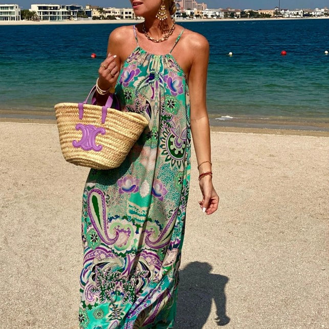 Aqua silk maxi dress to wear on holiday by Lindsey Brown luxury resort wear  worn by Anna Mavridis