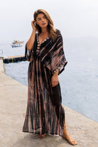 Black Silk maxi kaftan dresses to wear on holiday by Lindsey Brown luxury resort wear 