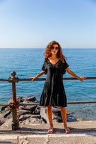 Black cotton beach dresses to wear on holiday by Lindsey Brown