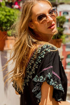 Black cotton blouson beach dress with aqua pink by Lindsey Brown luxury resort wear 