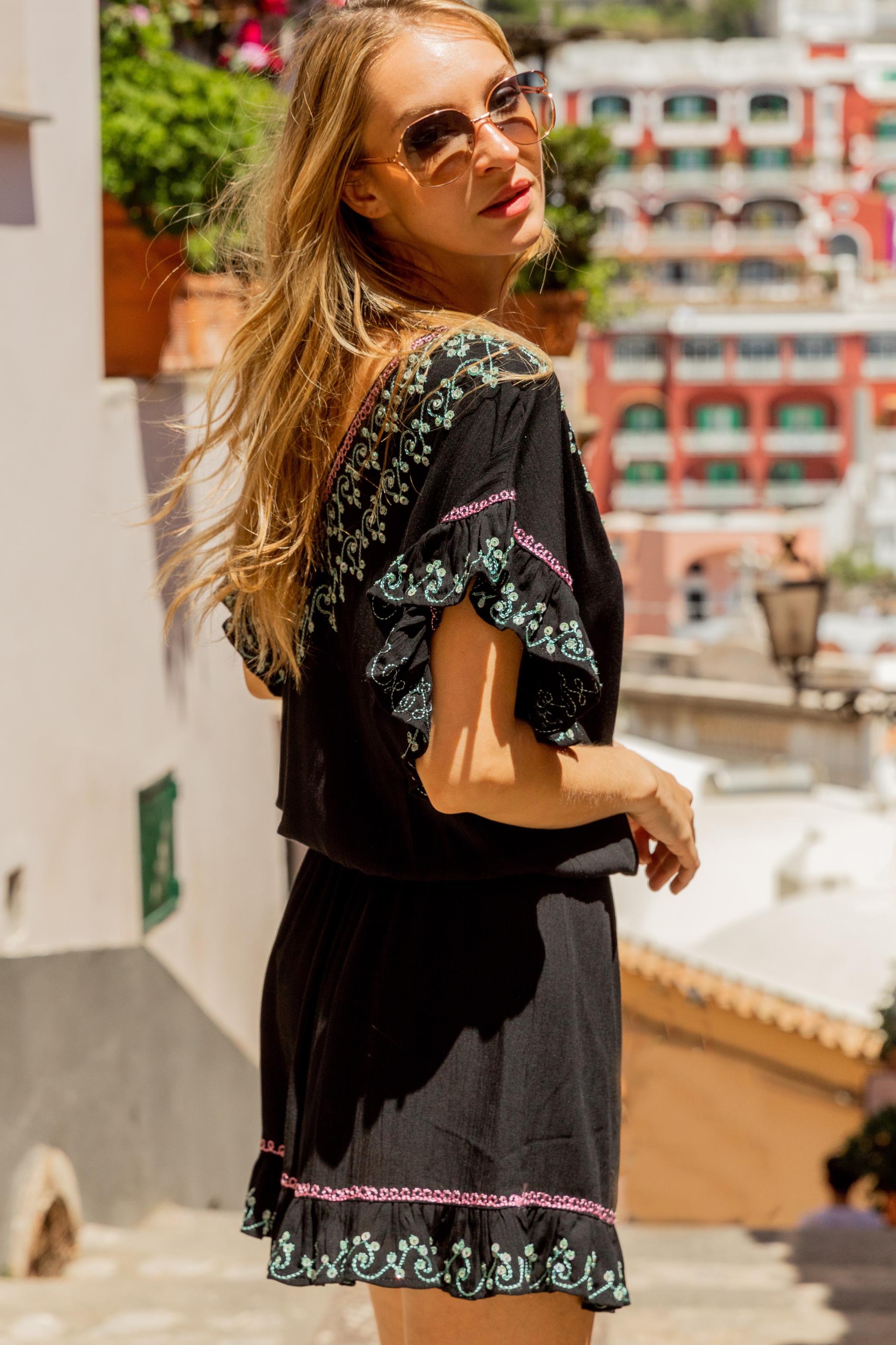 Black cotton blouson beach dress with aqua pink gold by Lindsey Brown luxury resort wear 