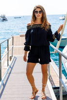 Black and gold cotton  off the shoulder tops to wear on holiday by Lindsey Brown resort wear 