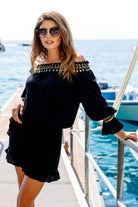 Black gold off the shoulder cotton top to wear on holiday by Lindsey Brown luxury resort wear 