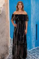 Black off the shoulder silk maxi dresses by Lindsey Brown silk resort wear 