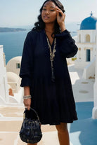 Black plus size cotton tiered dress to wear in summer, with long sleeves by Lindsey Brown cotton resort wear