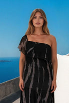 Black silk chiffon maxi dresses to wear on holiday by Lindsey Brown  resort wear 