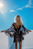 Black silk kaftans to wear on holiday by Lindsey Brown resort wear
