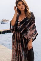 Black silk kaftan maxi dress  by Lindsey Brown luxury silk resort wear 