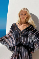 Black silk kaftan dresses by Lindsey Brown resort wear