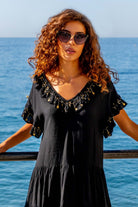 Black and gold cotton plus size beach dress to wear in the Caribbean by Lindsey Brown resort wear 