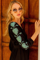black cotton beach dress with aqua embroidery by Lindsey Brown resort luxury wear 