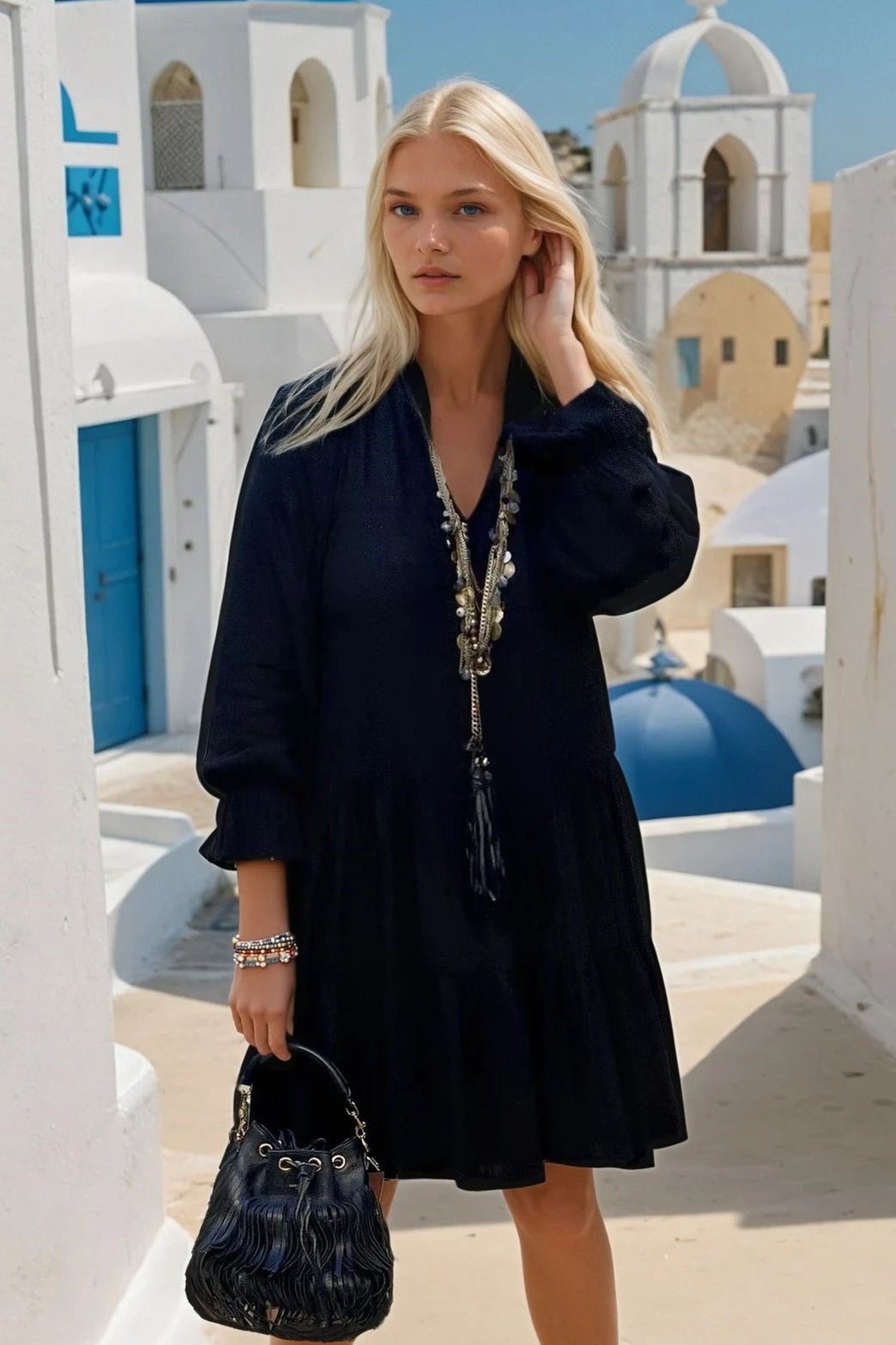 Black cotton long sleeved designer dress to wear in summer by lindsey brown 