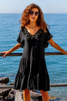 Black cotton loose fitting beach dresses by Lindsey Brown cotton resort wear 