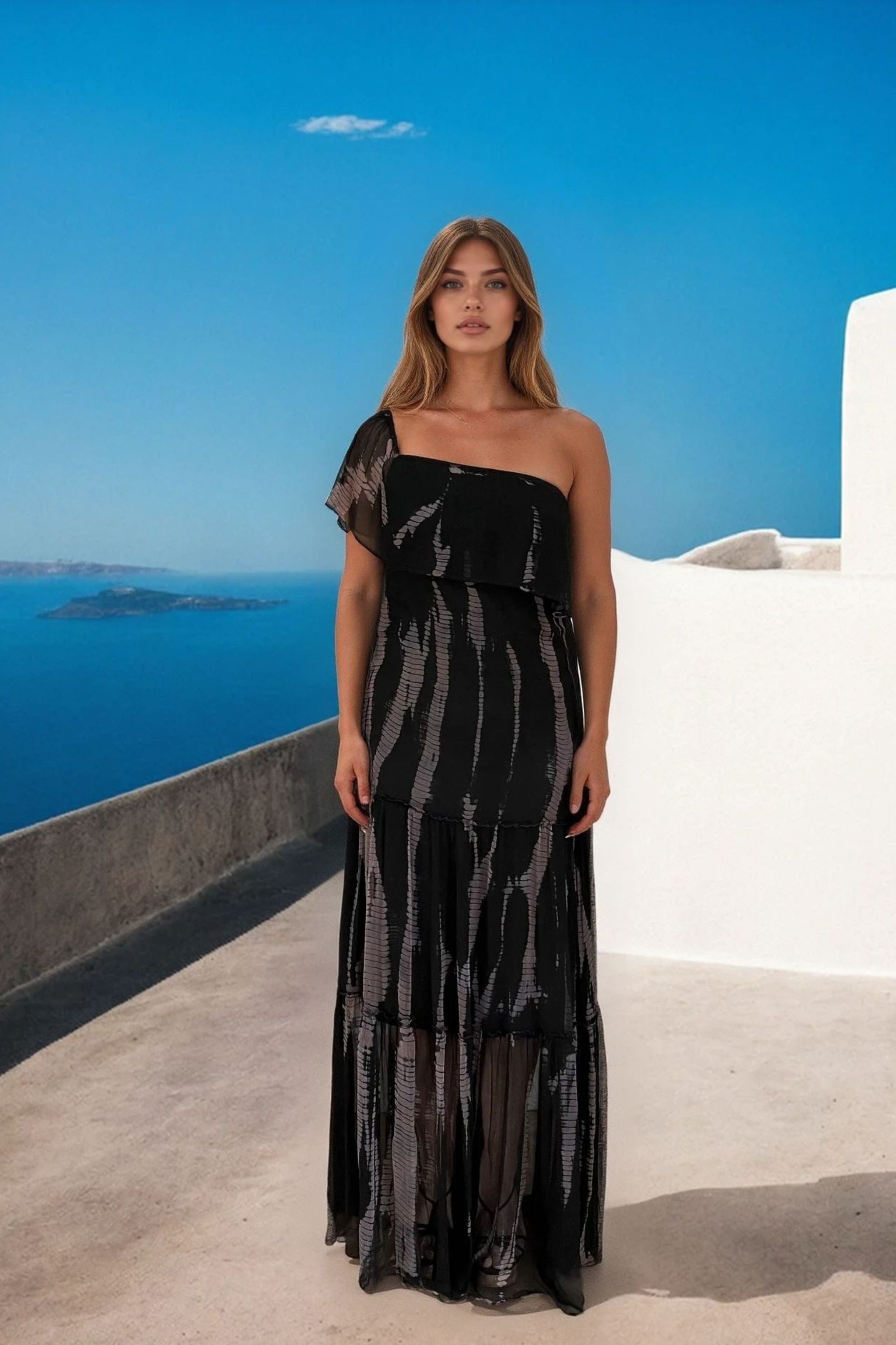 Black silk chiffon maxi dresses to wear to a wedding abroad by Lindsey Brown silk resort wear 