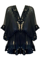 Black silk short deisgner kaftan to wear on holiday by Lindsey Brown luxury resort wear 