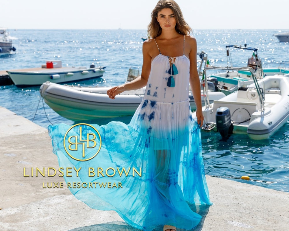 Blue silk Santorini tie dye floaty maxi dress to wear on Winter Sun vacations by  Lindsey Brown luxury resort wear