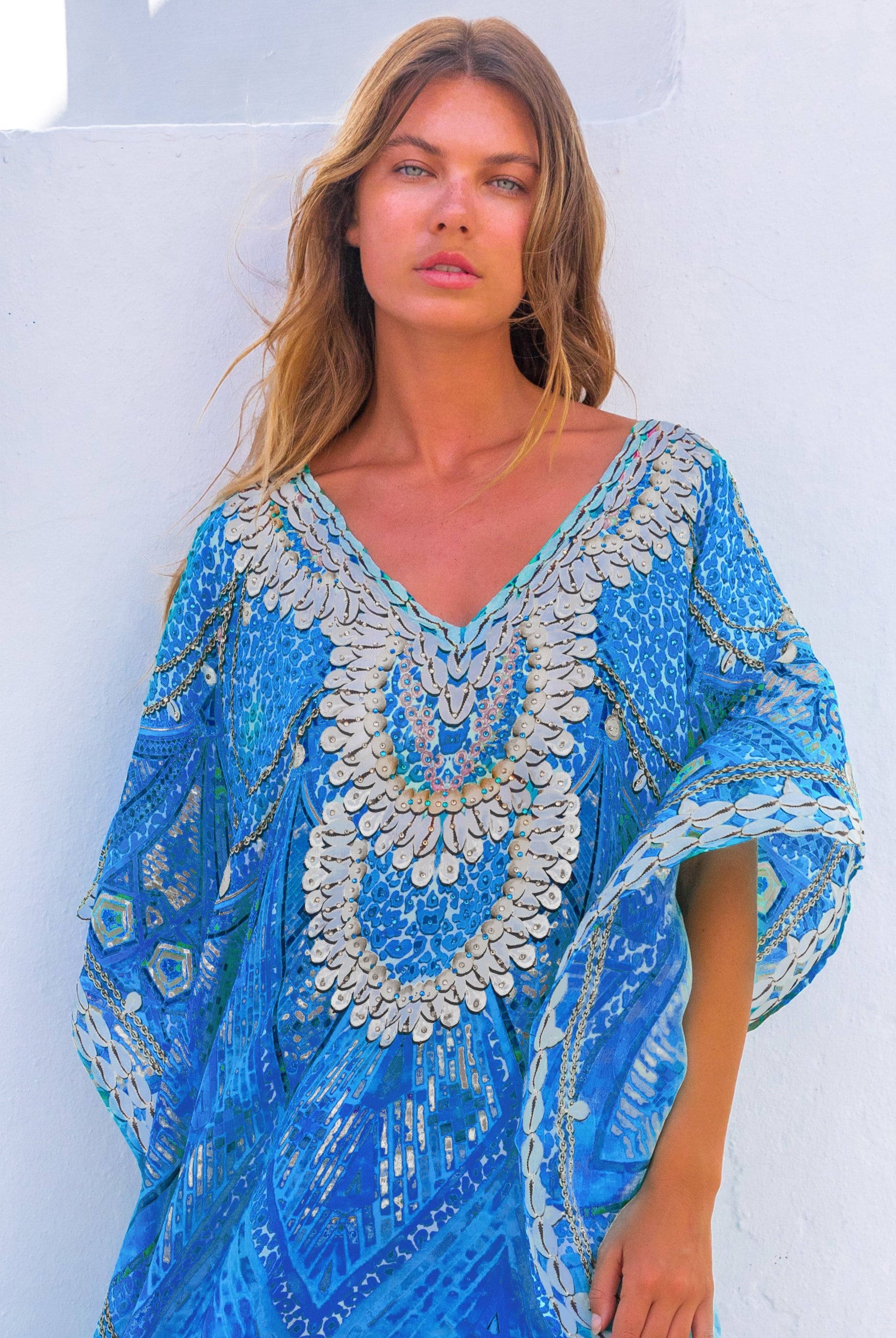 Blue floaty silk designer kaftans by Lindsey Brown resort wear to wear on a Caribbean Cruise holiday