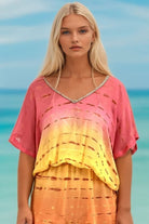 Coral yellow bloused silk kaftans by Lindsey Brown silk resort wear 