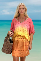 Coral and Yellow bloused silk kaftan by Lindsey Brown resort wear 