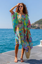 plus size turquoise yellow silk designer kaftans to wear on holiday by Lindsey Brown luxury resort wear 