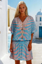 Lindsey Brown blue and pink beach dresses to wear in Barbados