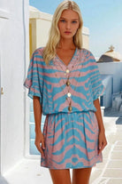 Lindsey Brown blue and pink beach dresses to wear on a luxury hoiday