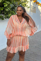 Peach Bloused Drop Waisted silk kaftan dress to wear on holiday by Lindsey Brown resort wear 
